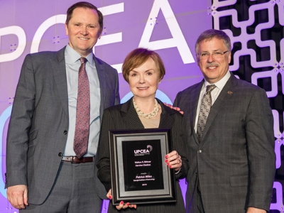 Bob Hansen, Patrice Miles, and Nelson Baker on stage at the 2019 UPCEA Annual Conference