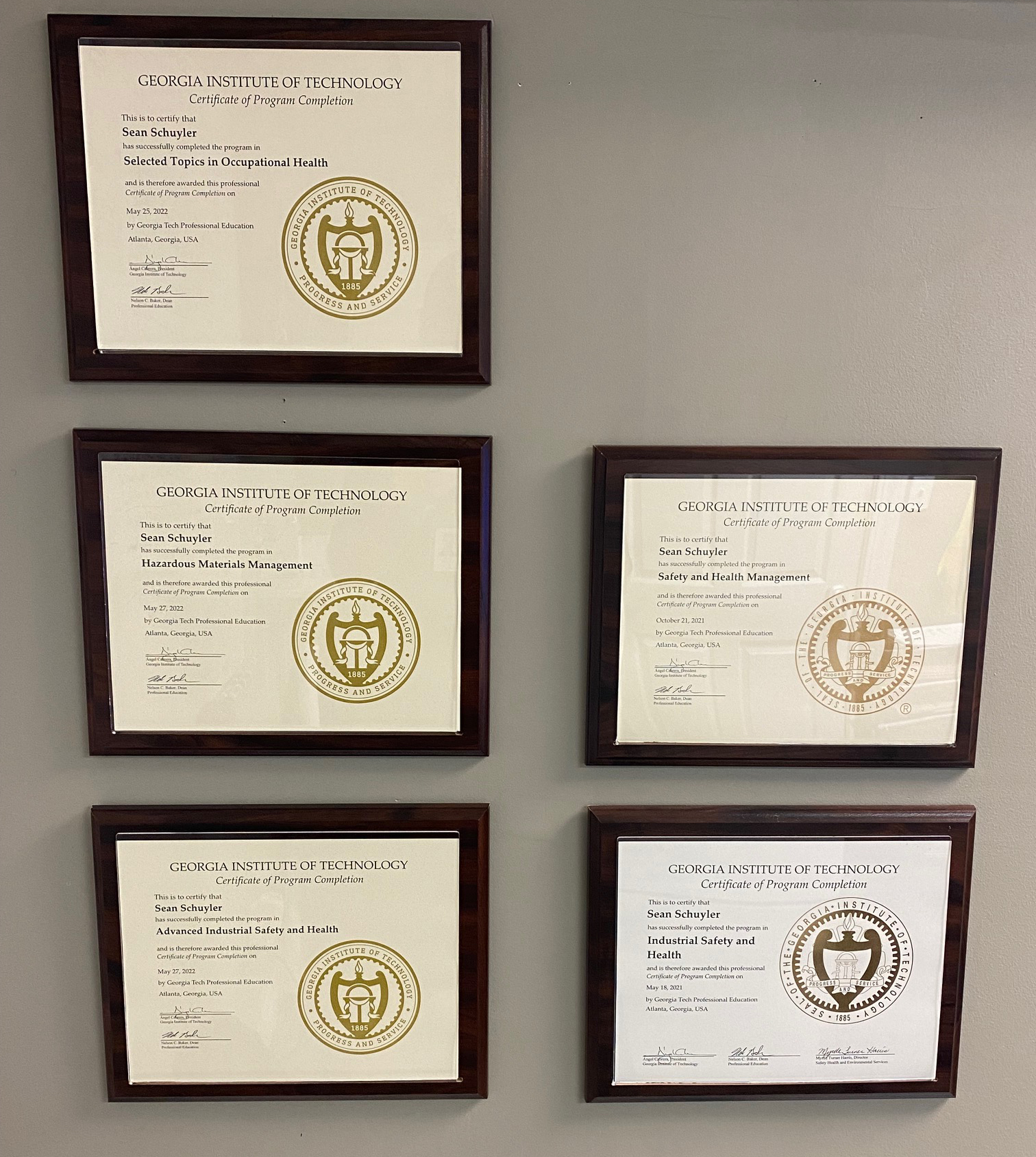 Sean's 5 Georgia Tech Occupational Safety and Health certificates hung on a wall.