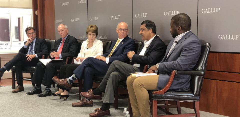 Some of the nation'as leading thinkers in higher education gathering on stage for roundtable