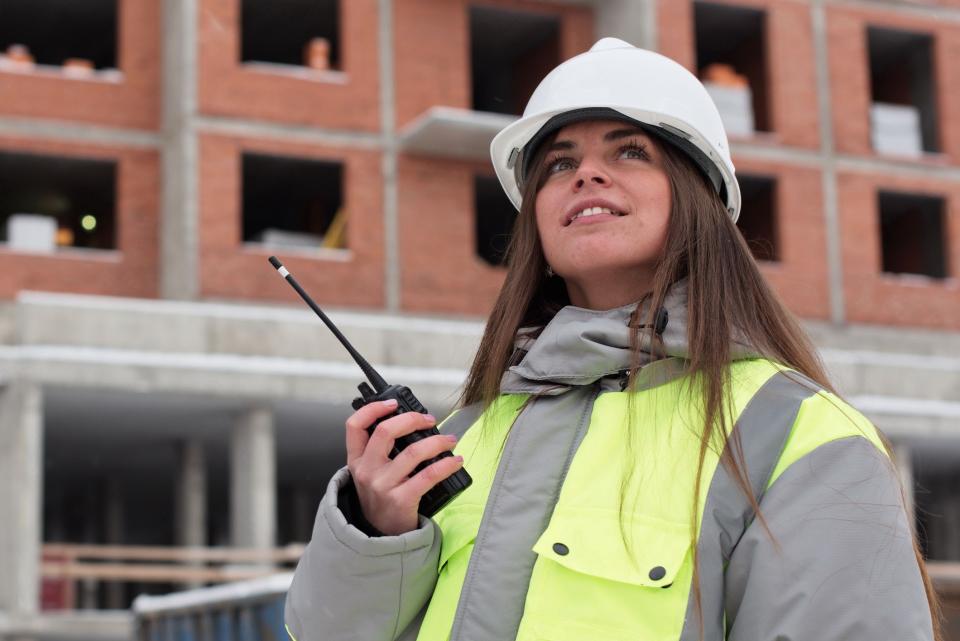 Female safety professional on job site