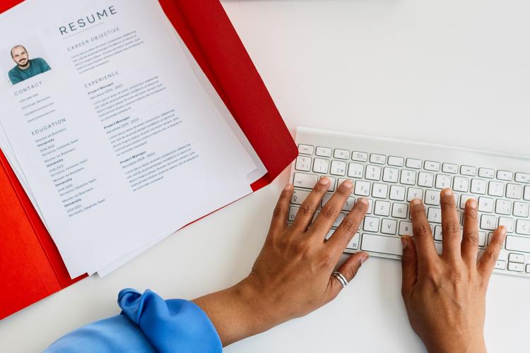 Person working on updating a resume