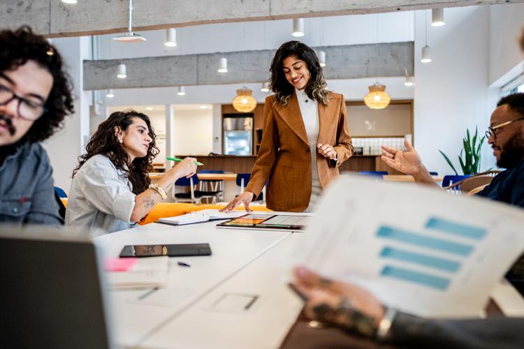 A group of project managers having a meeting in an office.