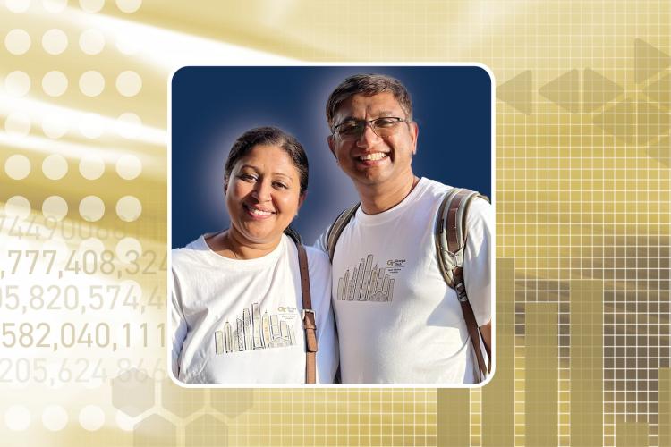 Man and woman smiling, stand side-by-side in white t-shirts against a gold background.