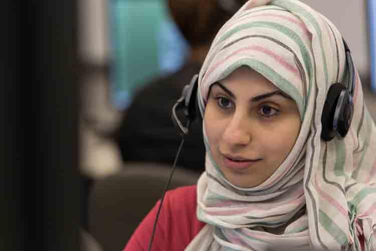 English as a Second Language learner using a headset