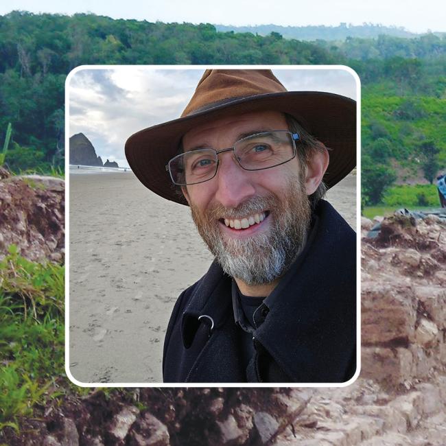 Headshot of Scott Cardinal over an excavation site photo