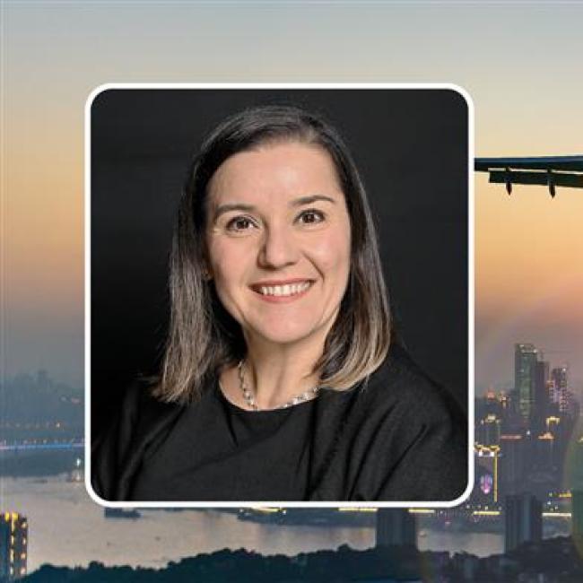 OMS Analytics alumna Claudia Scott's headshot on top of a background image of an airplane takeoff over a city landscape.