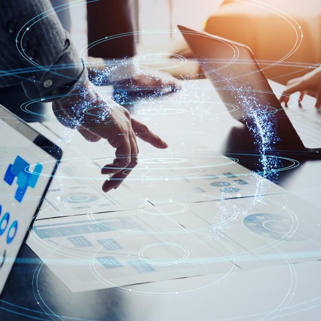 Laptops with AI graphic overlay