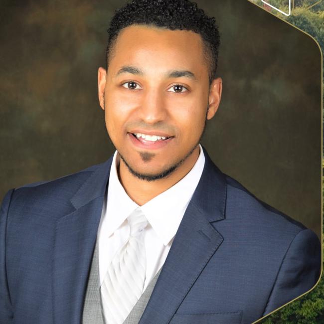 Chris Carter's headshot in a hexagon alongside Tech Tower