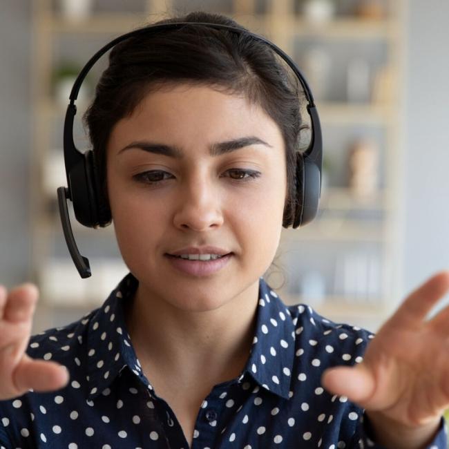 Female learner participating in an online, accredited intensive English program